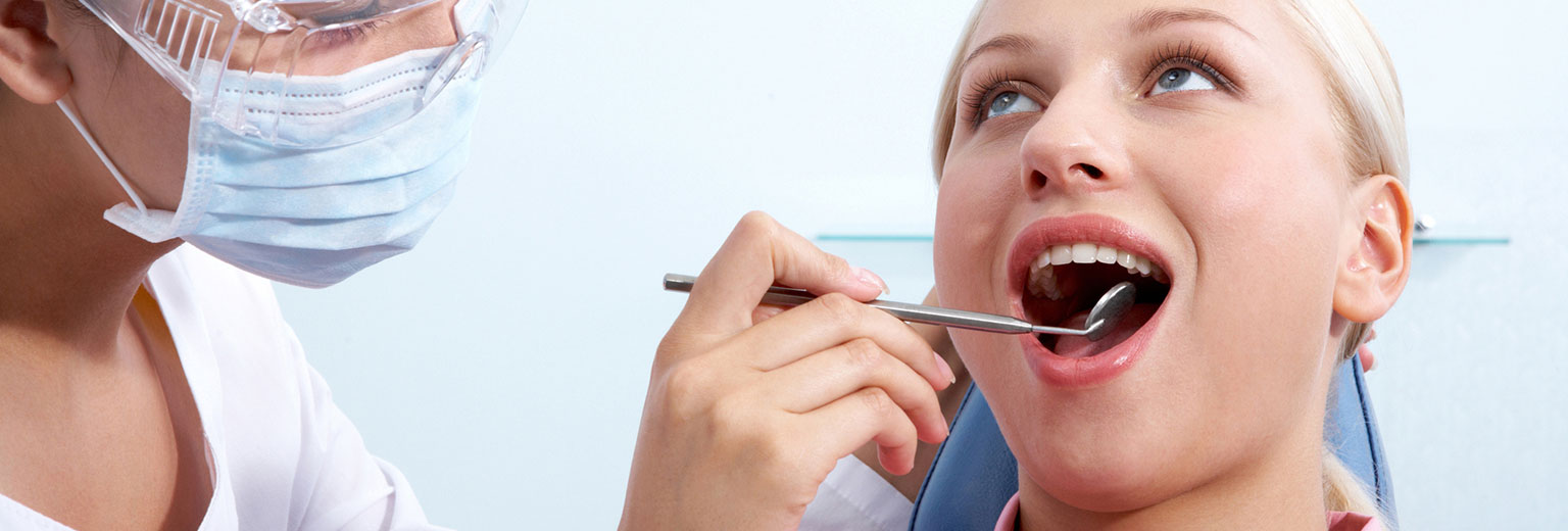 Lady having a tooth filling